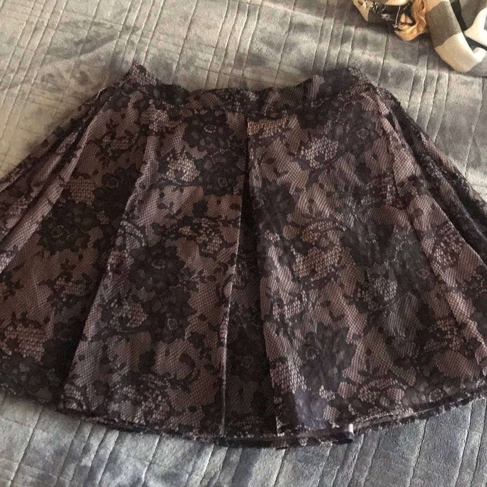 A lace organza mini skirt never worn